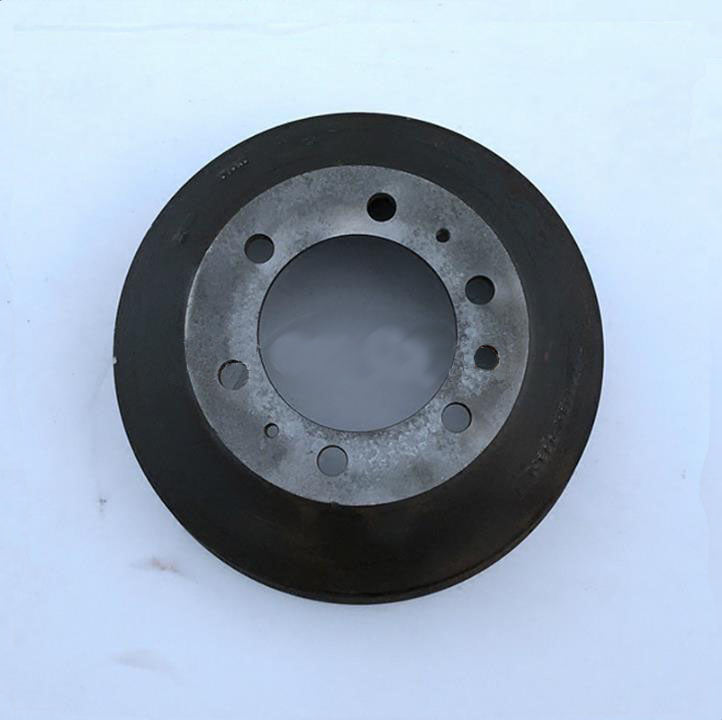 Rear brake drum with center hub and multiple bolt holes, dark outer rim