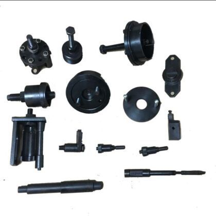 Black engine repair tool kit with multiple metal drive parts and pins