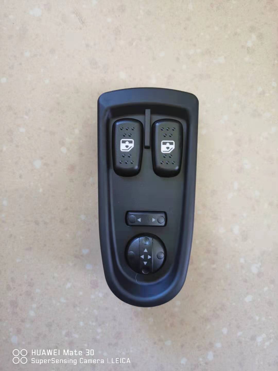 Electric lifter switch with two window control buttons and central joystick