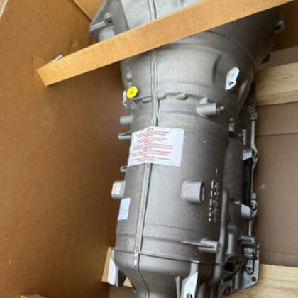 Automatic transmission assembly in cardboard box with label and service connections