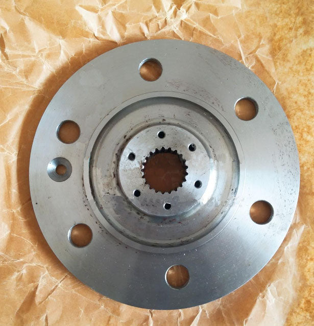 Front wheel connecting flange with six bolt holes and inner splined hub, metal disc