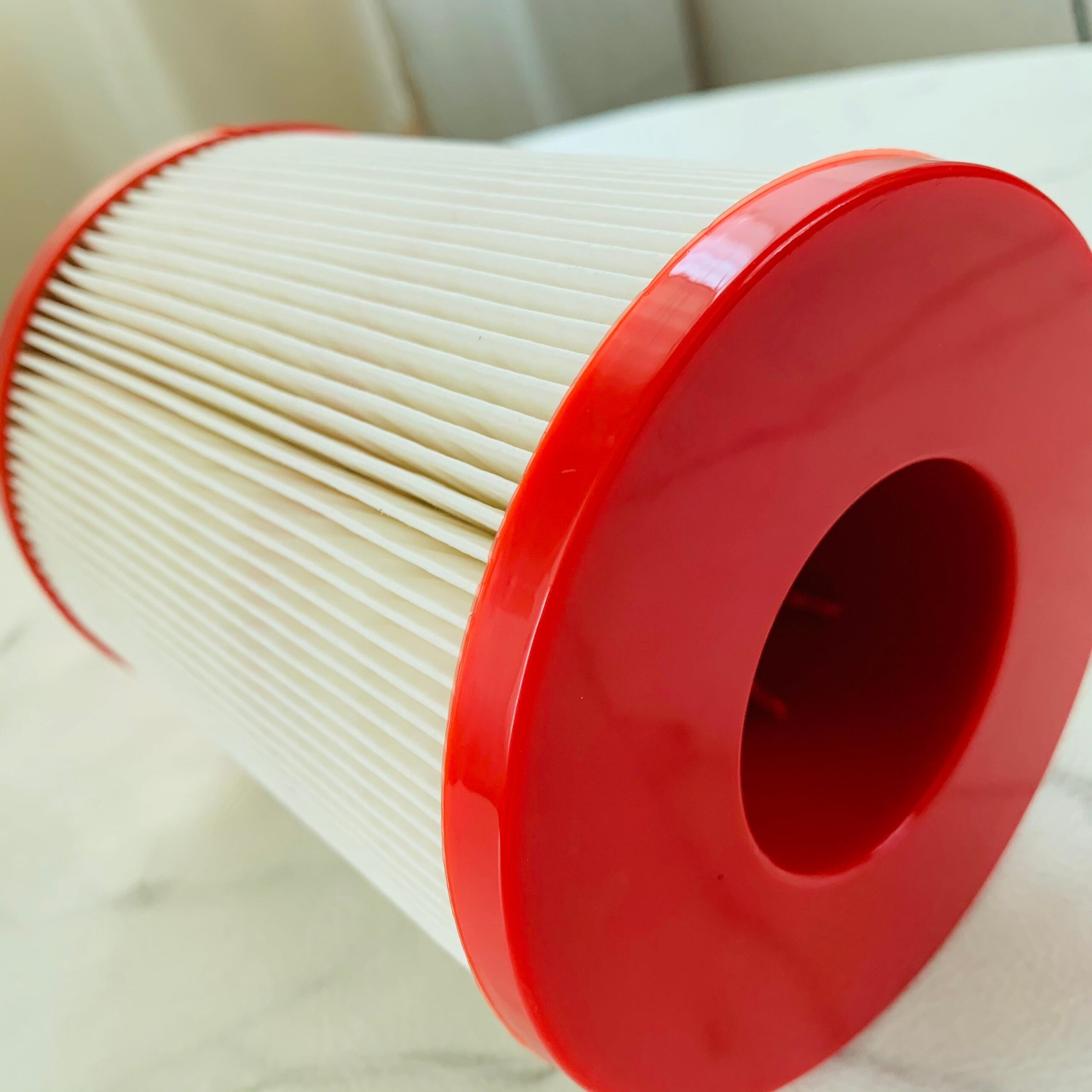 Oil water separator filter cartridge, red end housing and white pleated element