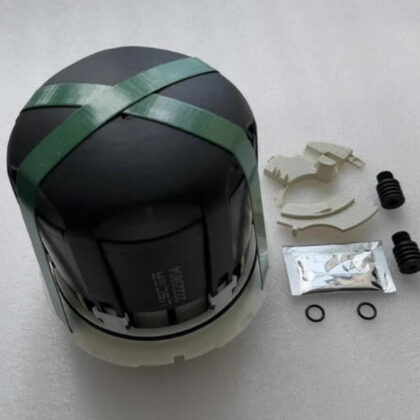 Automotive dryer cartridge: black housing, green strap, and included mounting parts