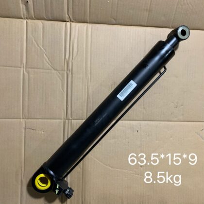 Black cabin cylinder with mounting eye ends and yellow bushing ring
