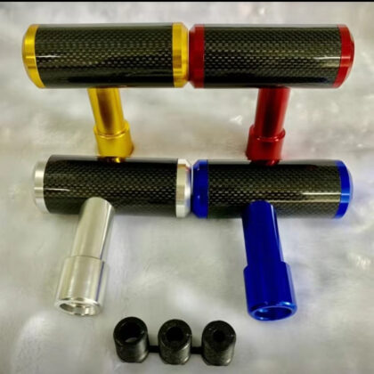 Carbon fiber shift knob set with red and blue accents and three black collars.