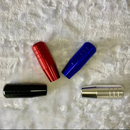 Set of aluminum shift knobs: red, blue, black, and silver with ribbed grips