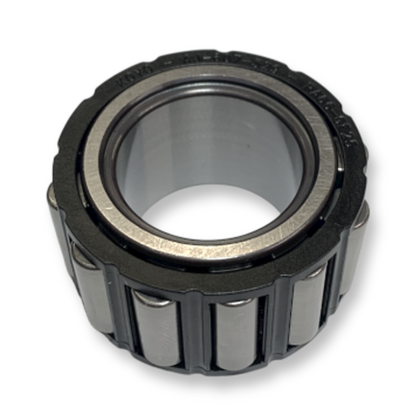 Cylindrical needle bearing with dark outer ring and inner metal race