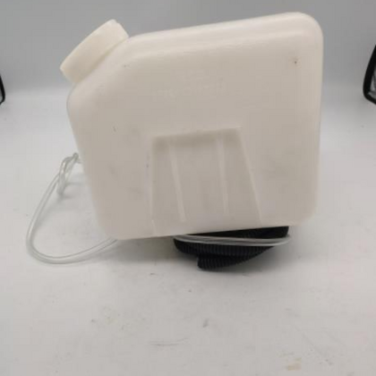 White plastic washing tank reservoir with cap and attached hose